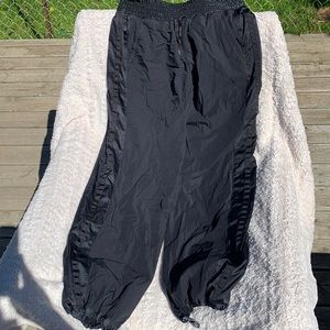 These are rain pants with leggings attached or track pants with leggings